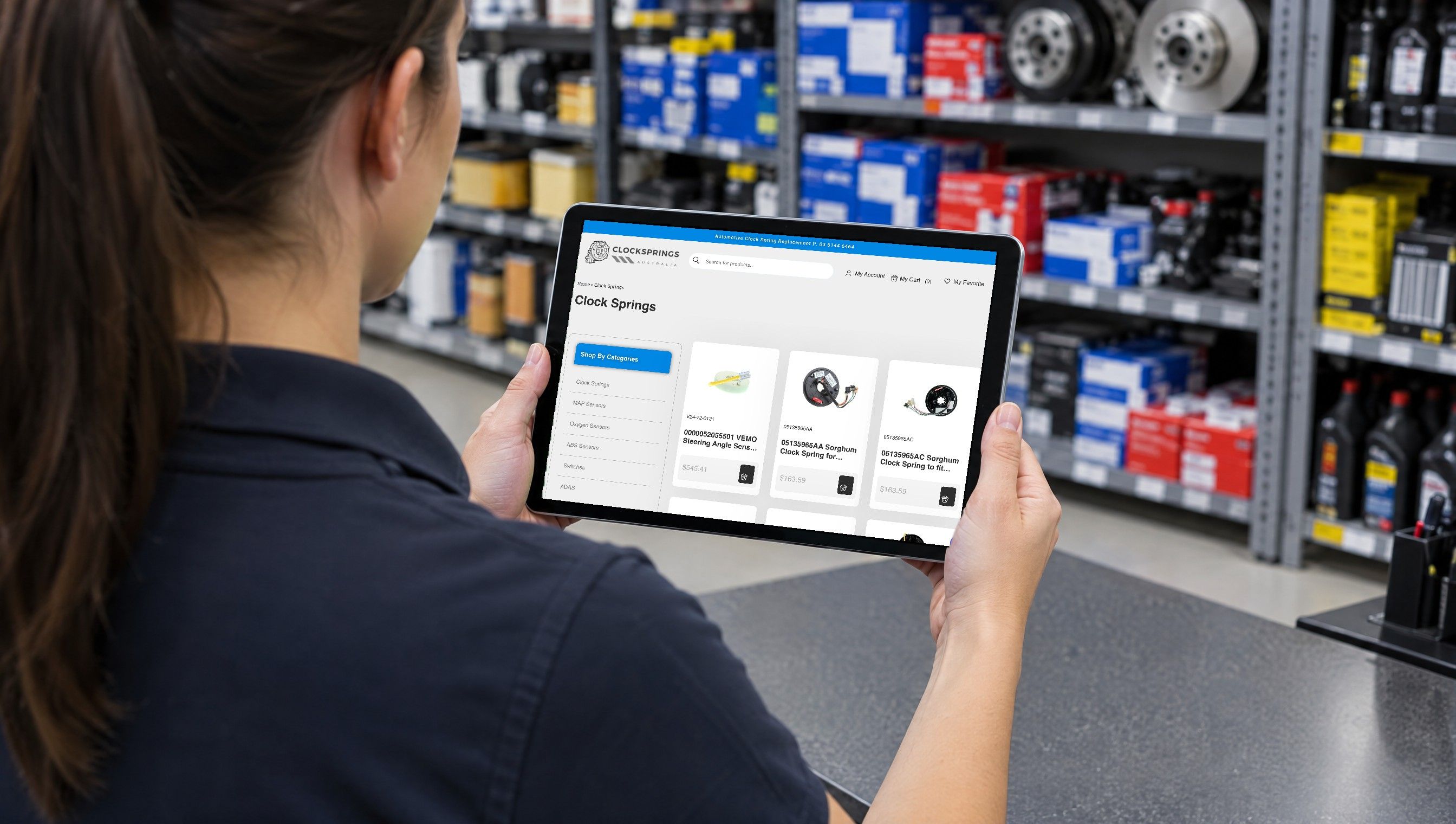 The Clocksprings Australia clock springs range on a tablet at an auto parts counter
