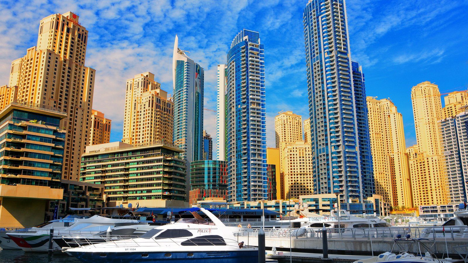 Dubai Marina towers and yachts on a clear day